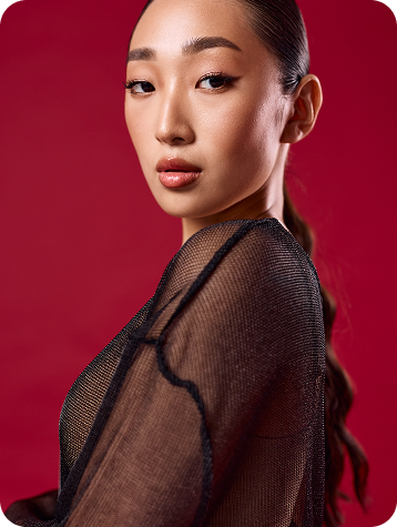 Professional woman portrait in a light outfit looking toward the camera for CP&KRELL